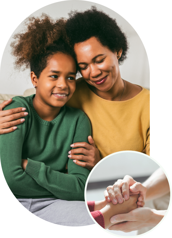 A woman and a child sit closely on a couch, smiling. Inset shows a close-up of hands massaging a person's foot.
